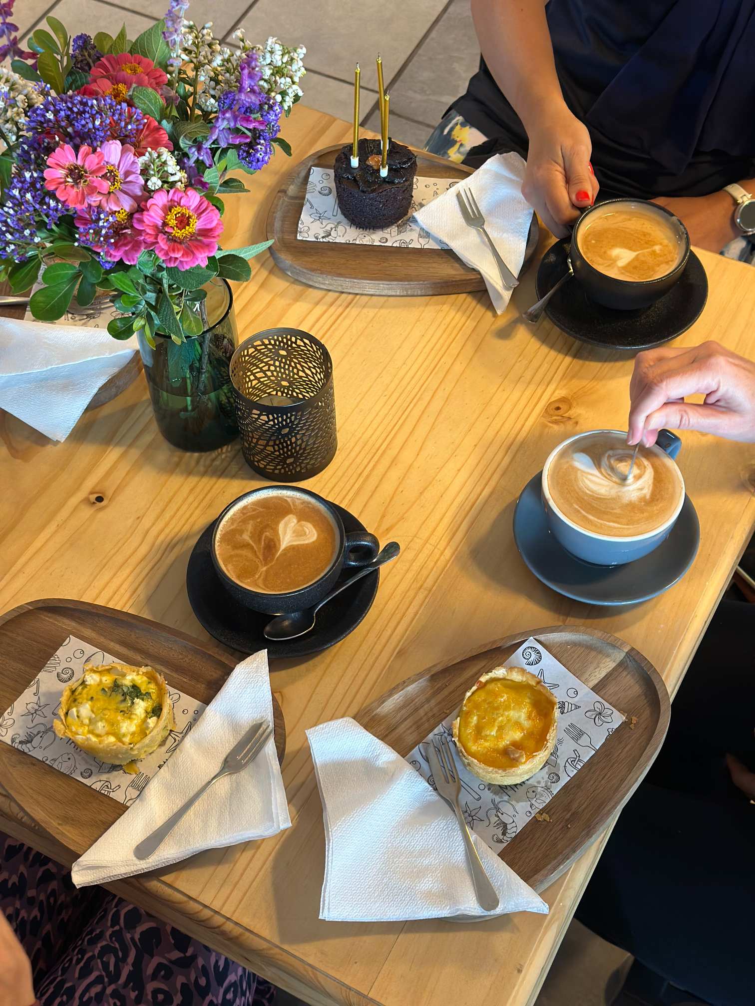 A table with coffee and baked goods